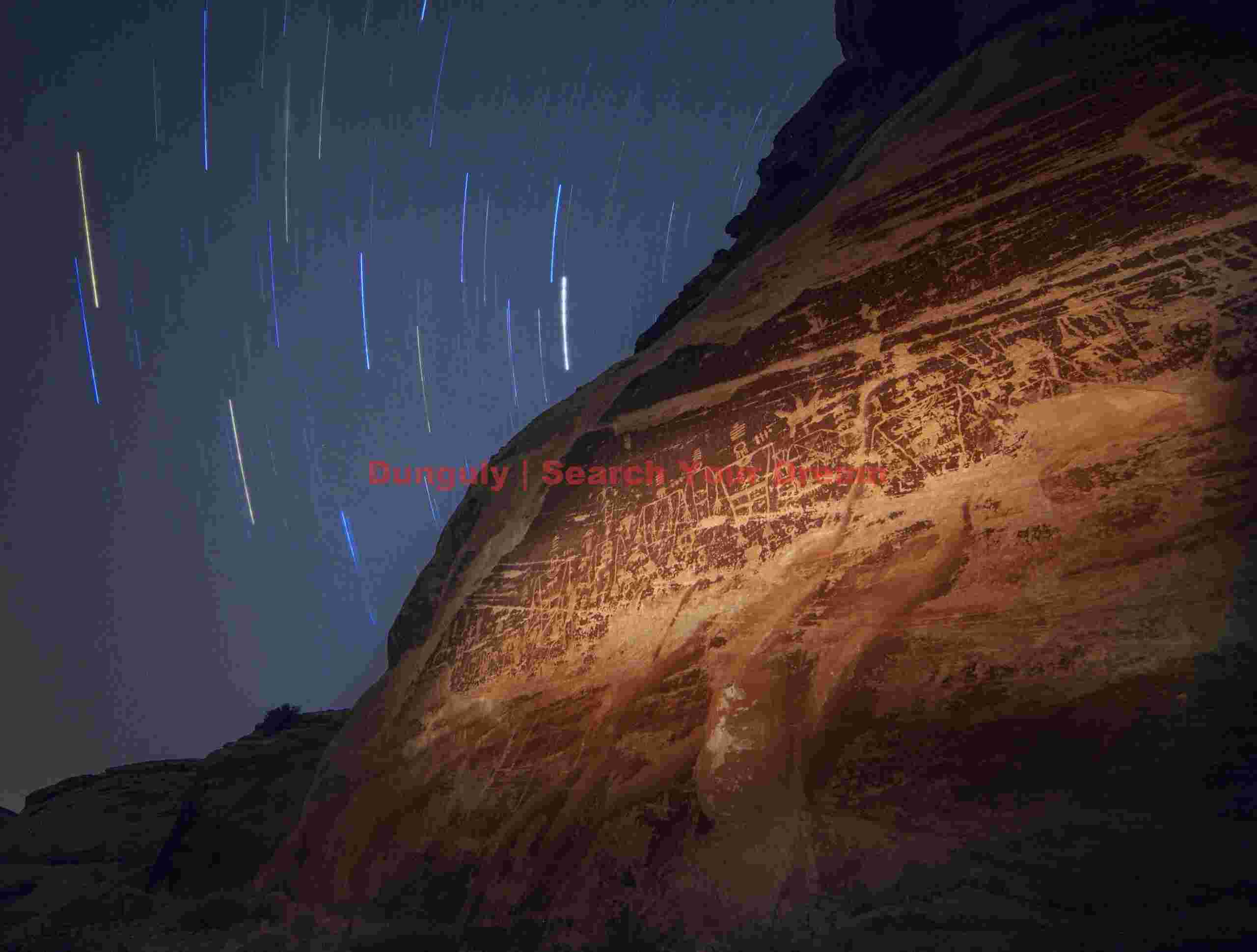Butler Wash petroglyph panel with star trails Butler Wash Petroglyph Panel with Star Trails