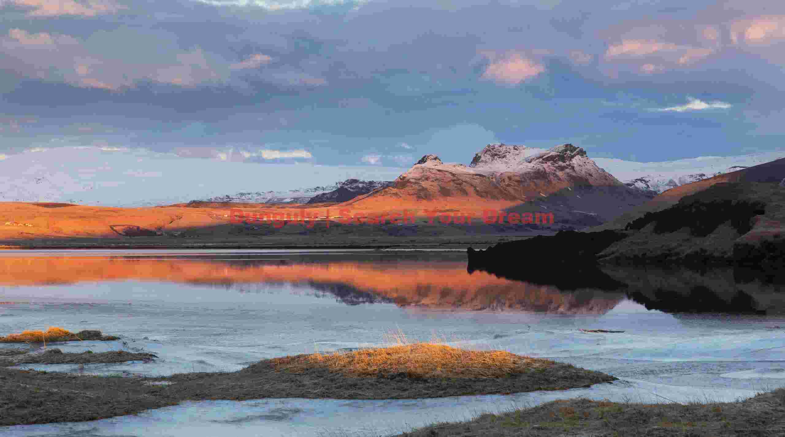 Dyrholaeylagoon at sunrise; South Iceland Glacial Ice Formation at Dyrholaeylagoon at sunrise