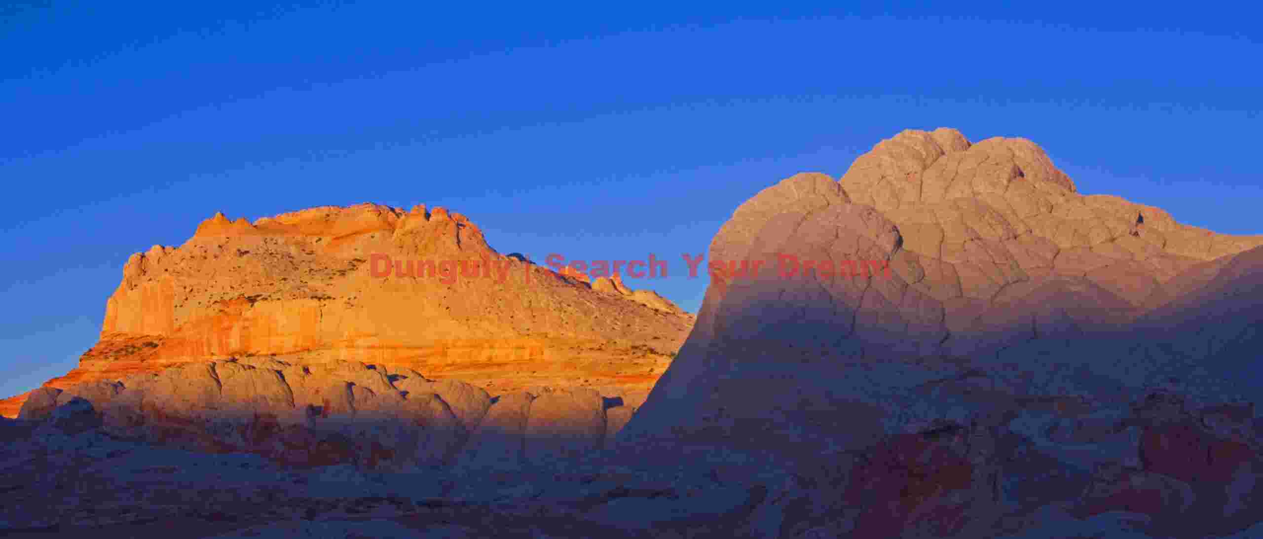 Sunrise on White Pocker butte and brain rock Sunrise on White Pocker butte and brain rock