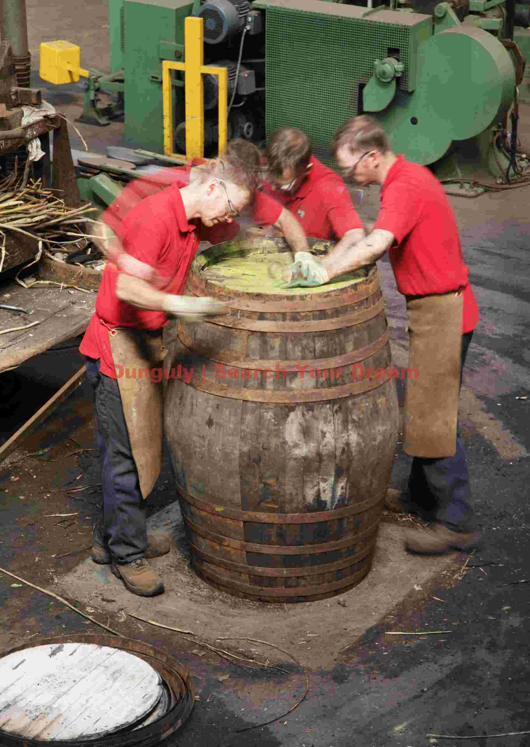 Fixing the last hoop; Speyside Cooperage Fixing the last hoop