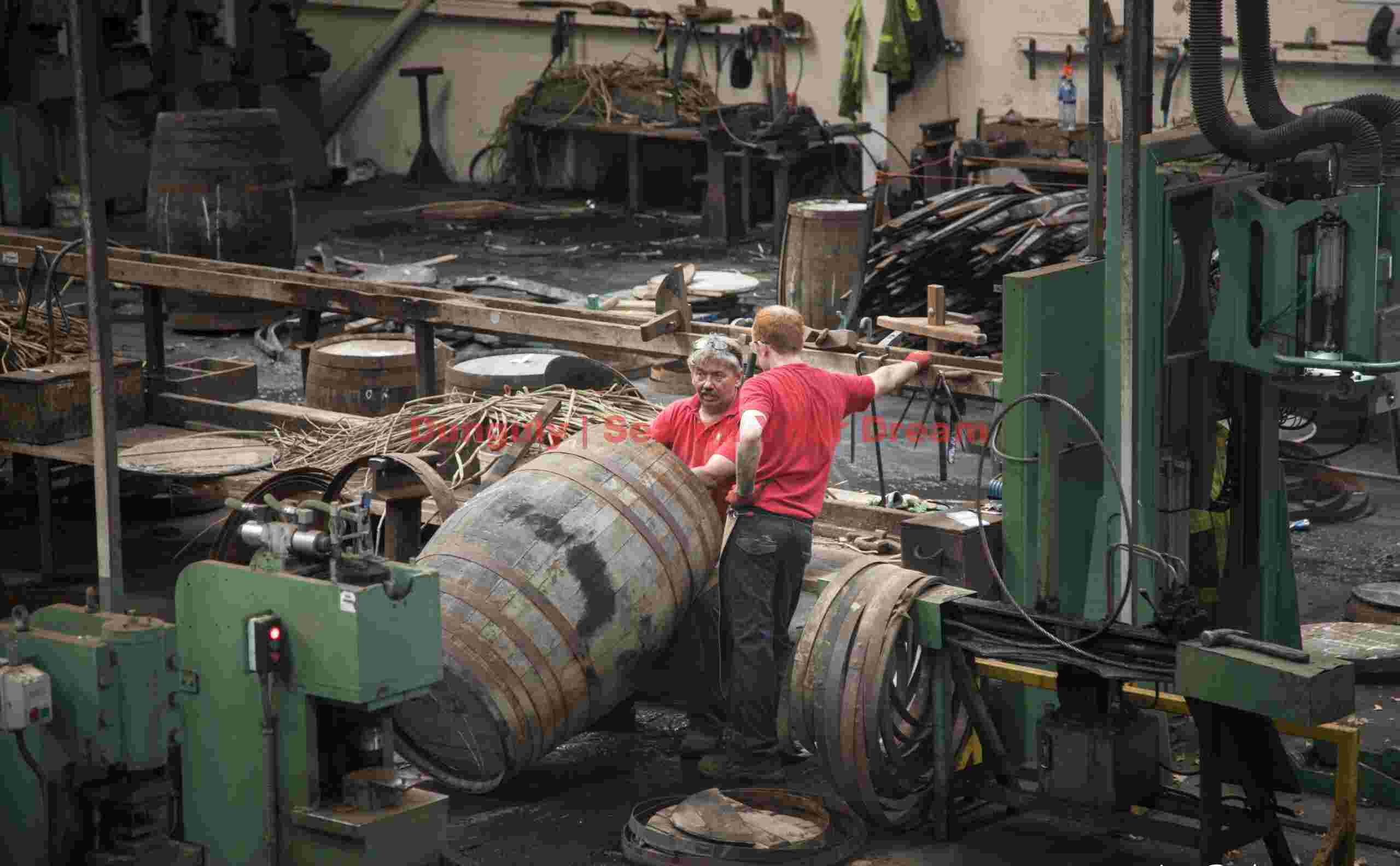 Green machines, red shirts; Speyside Cooperage Green machines, red shirts