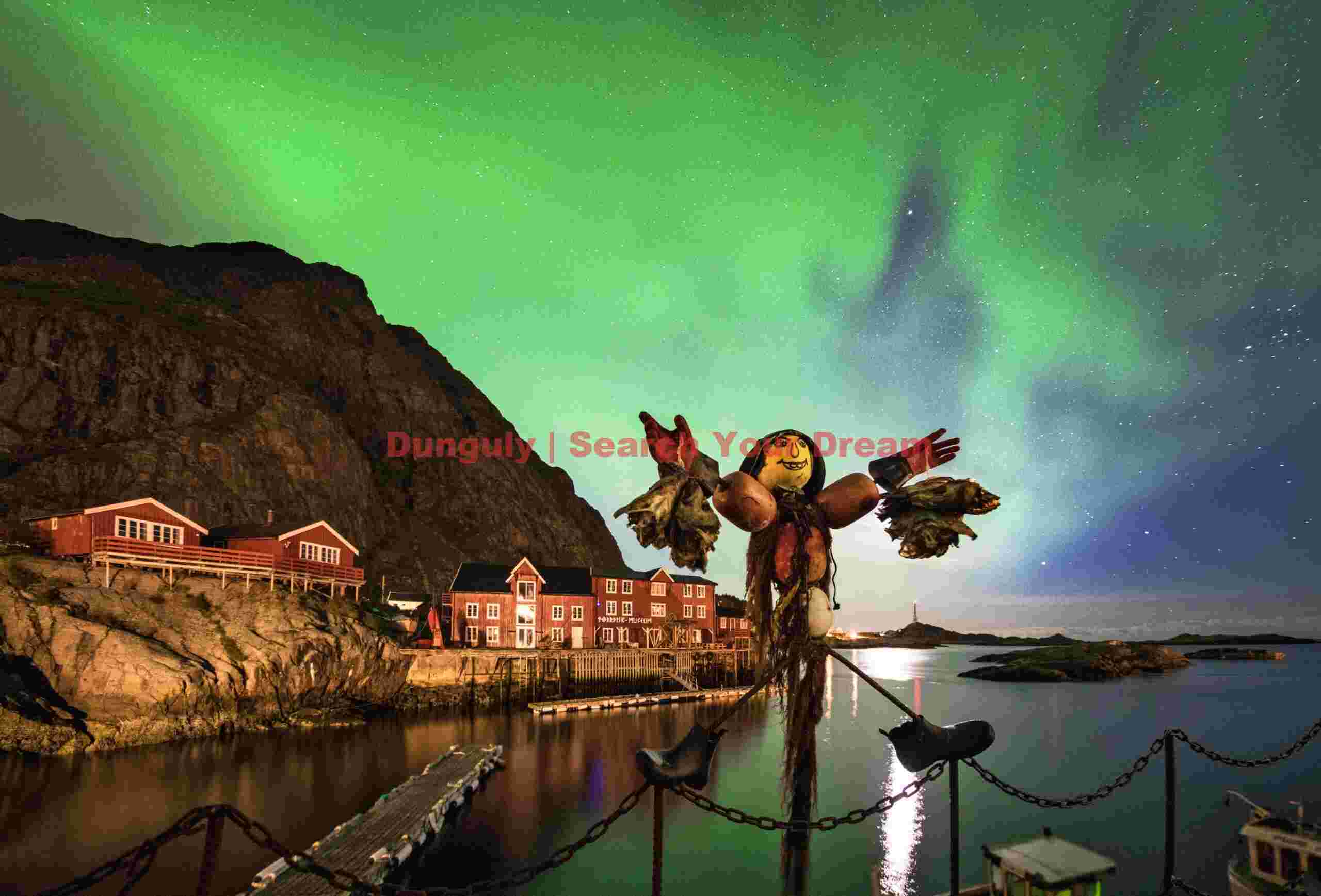 Stockfish greeter with aurora; Å, Lofoten Islands, Norway Stockfish greeter with aurora