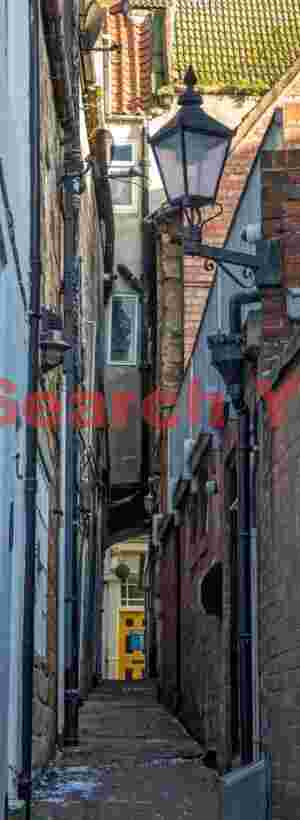 Street lamp in narrow alley