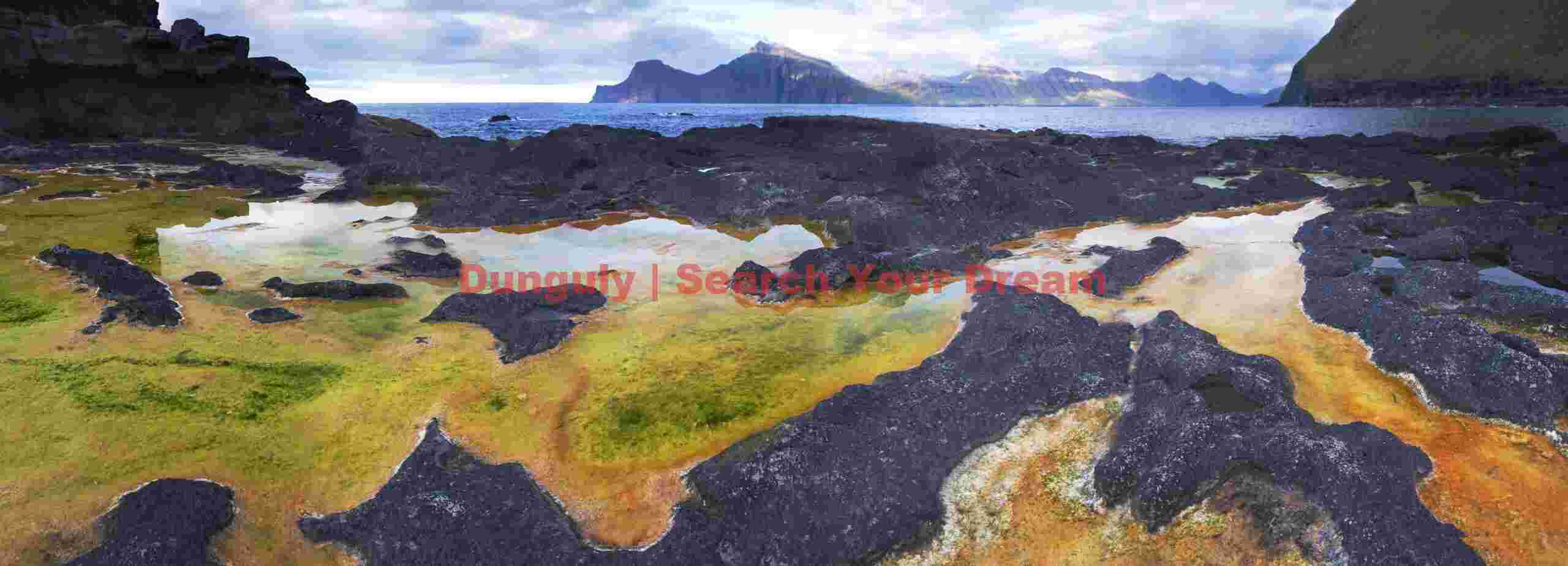 Yellow, red and green tidepool panorama; Gjógv, Faroe Islands Yellow, red and green tidepool panorama