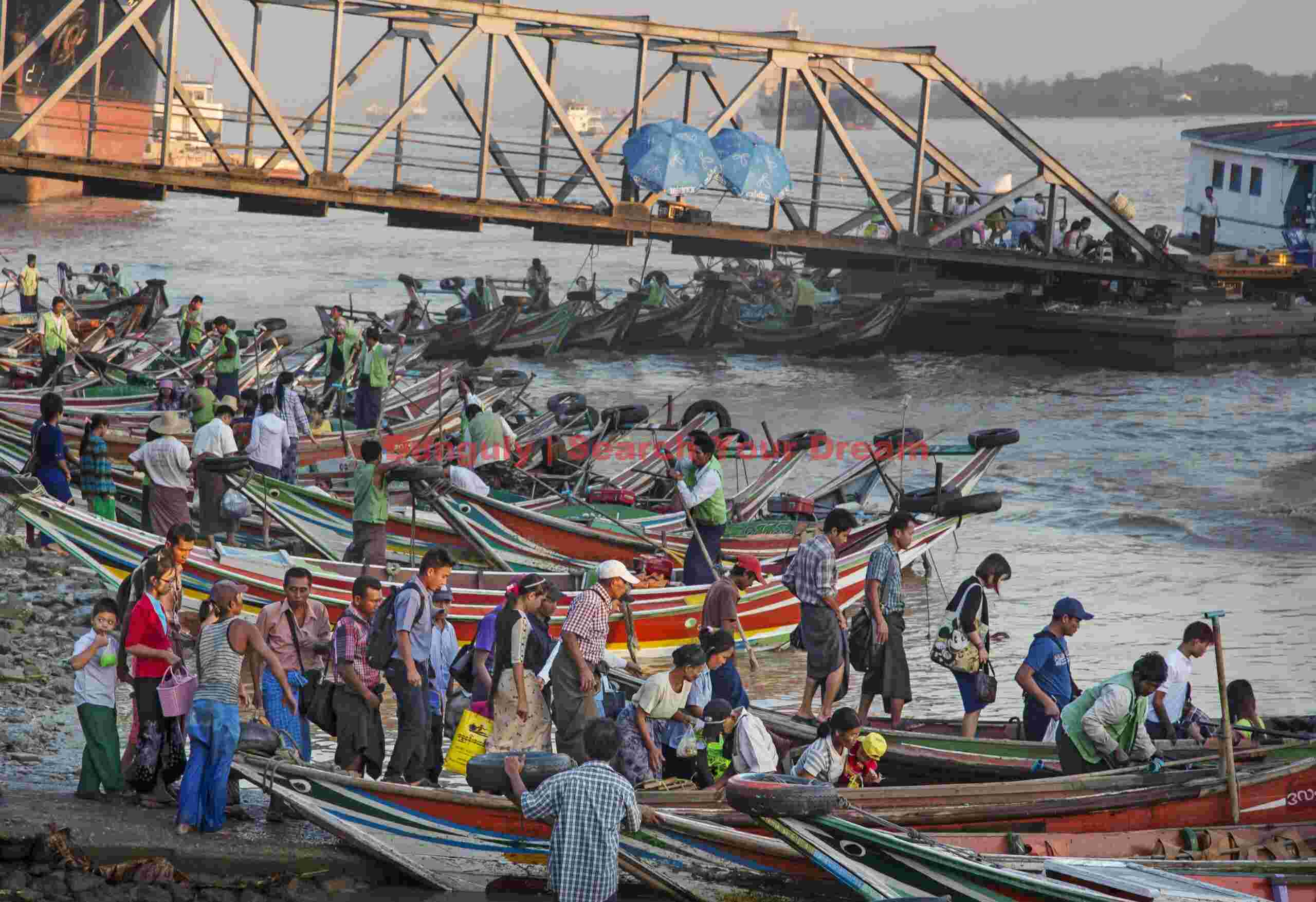 A mass of boats and passengers; Yangon, Burma A mass of boats and passengers