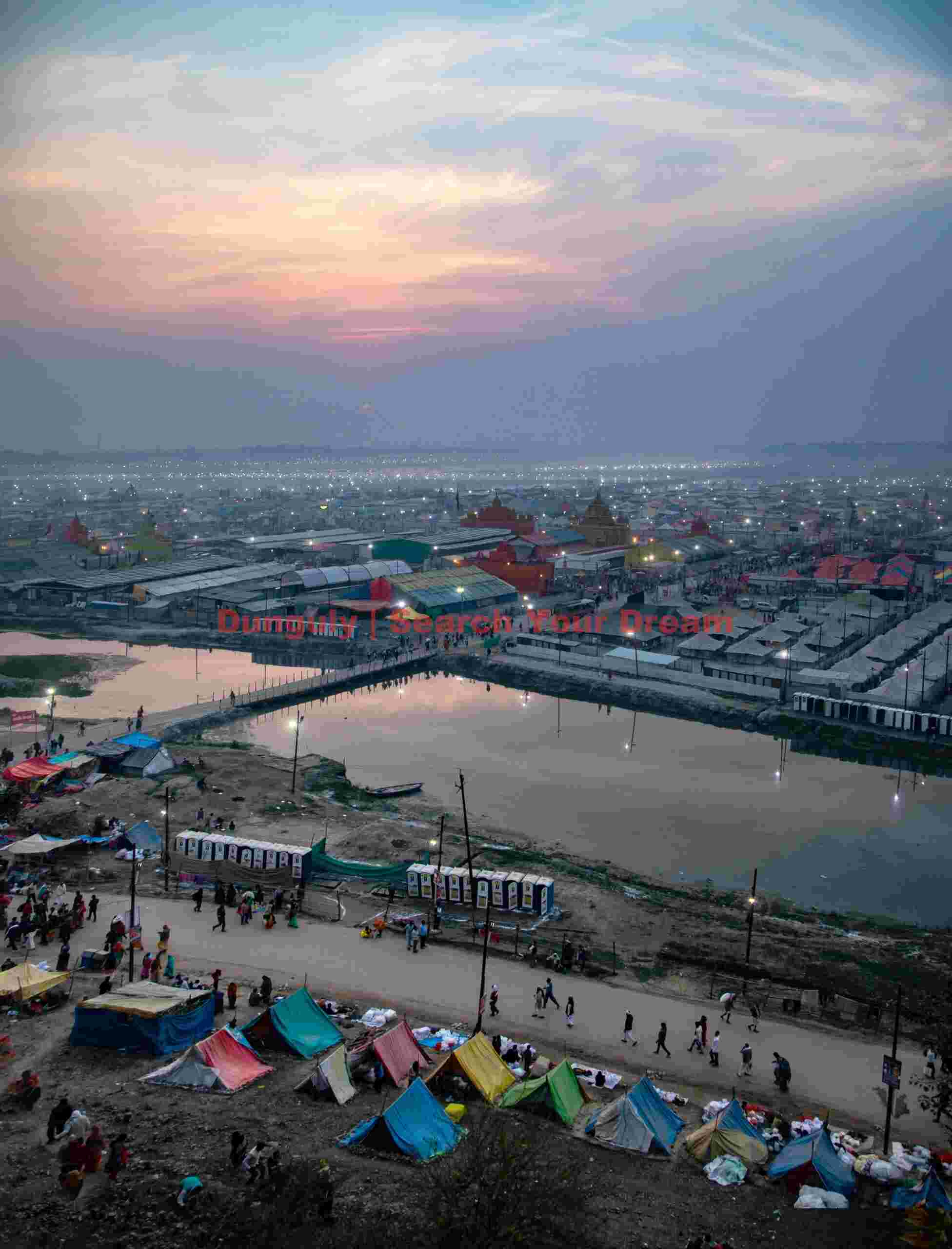 Dawn light over the Kumbh Mela; Kumbh Mela, Allahbad, India Dawn light over the Kumbh Mela
