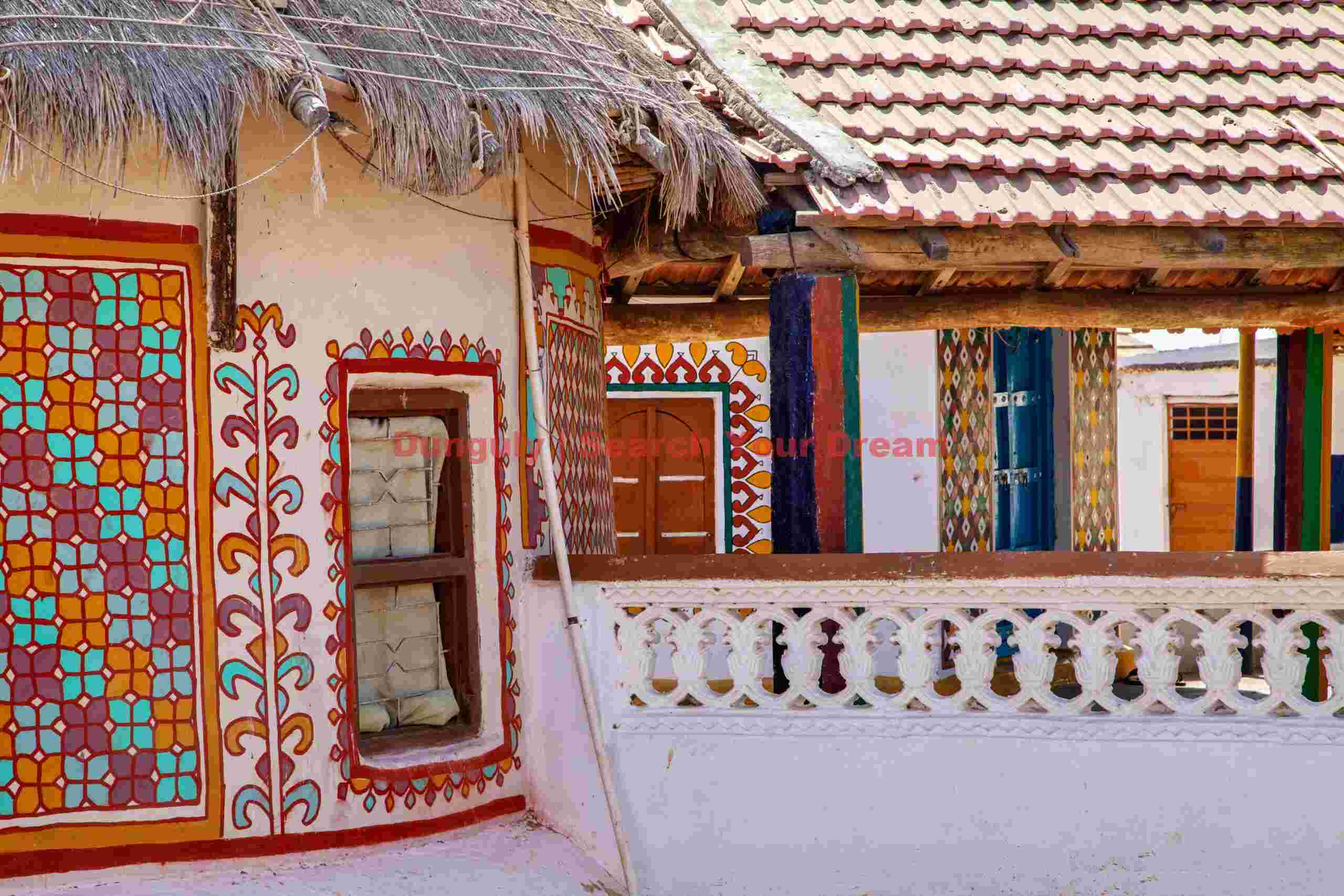 Decorated cottages; Along the road, Rann of Kutch Decorated cottages