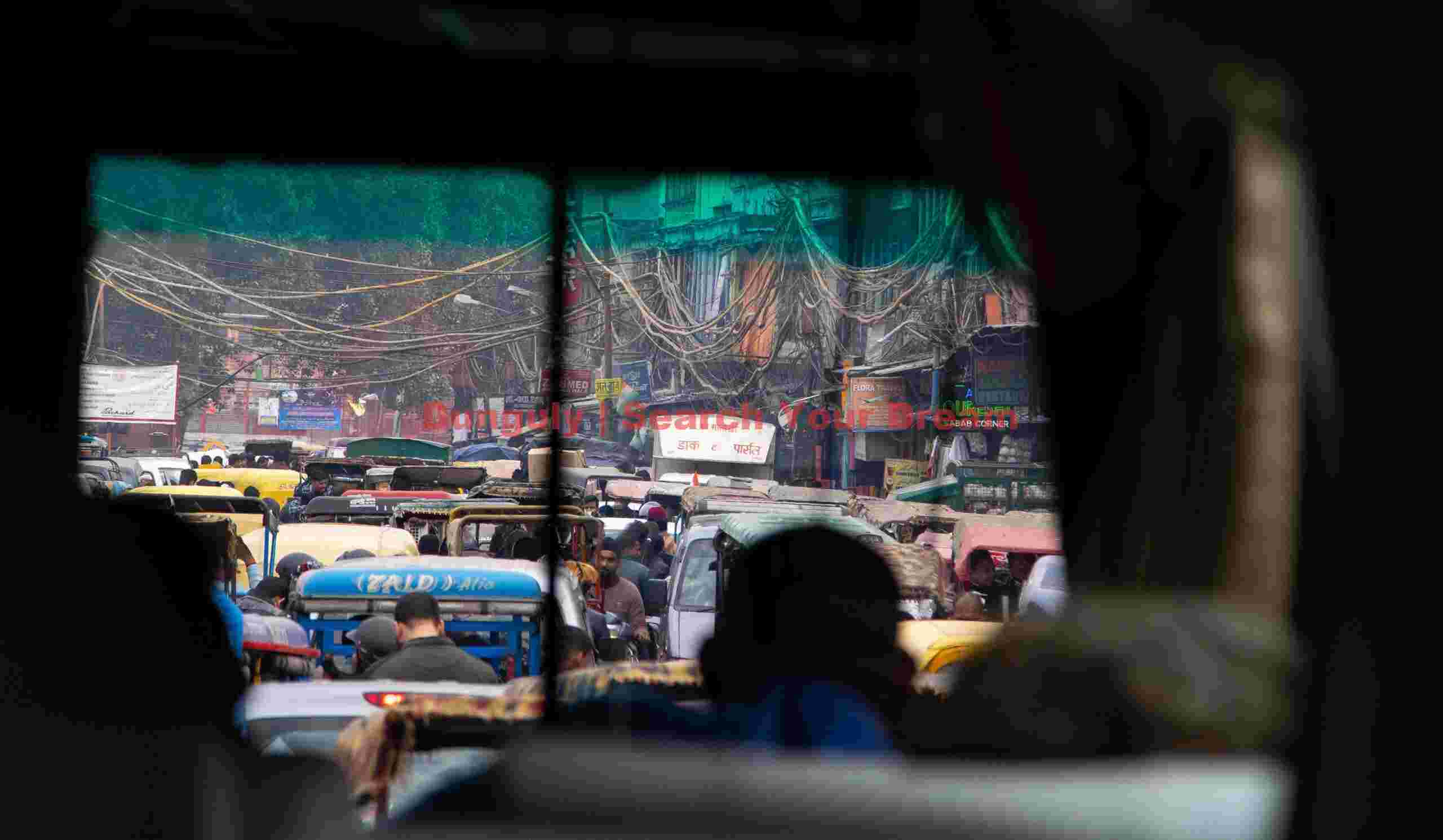 Driving through traffic; Old Delhi Driving through traffic