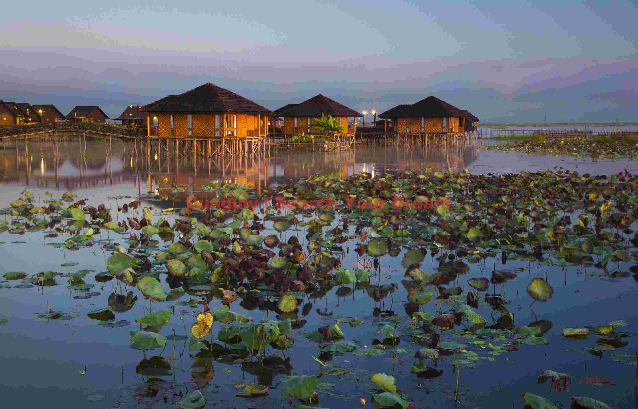 Golden Isles Cottages during the golden time before sunrise; Inle Lake, Burma Golden Isles Cottages during the golden time before sunrise