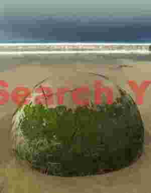 Green orb under storm cloud