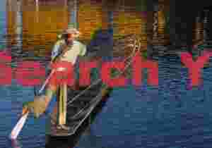 Leg-rowing fisherman and golden refections