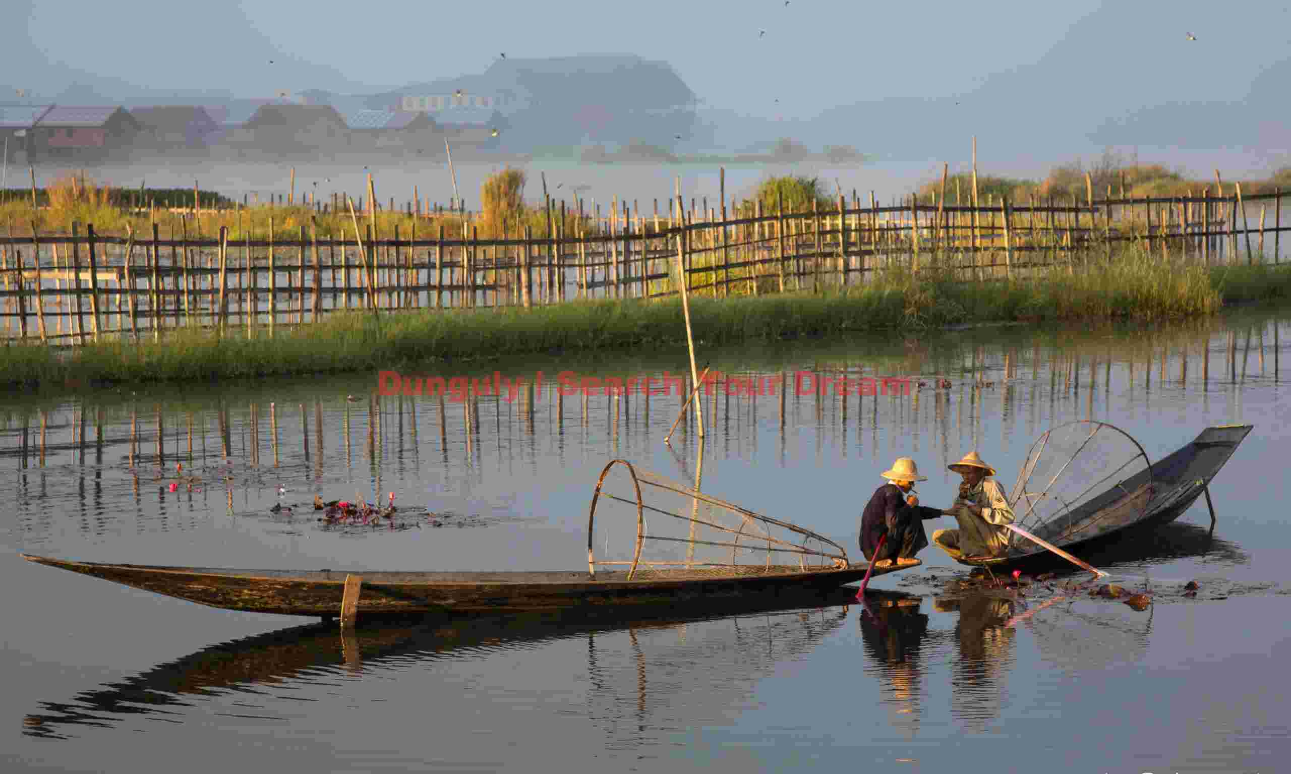 Misty morning, two fishermen; Inle Lake, Burma Misty morning, two fishermen