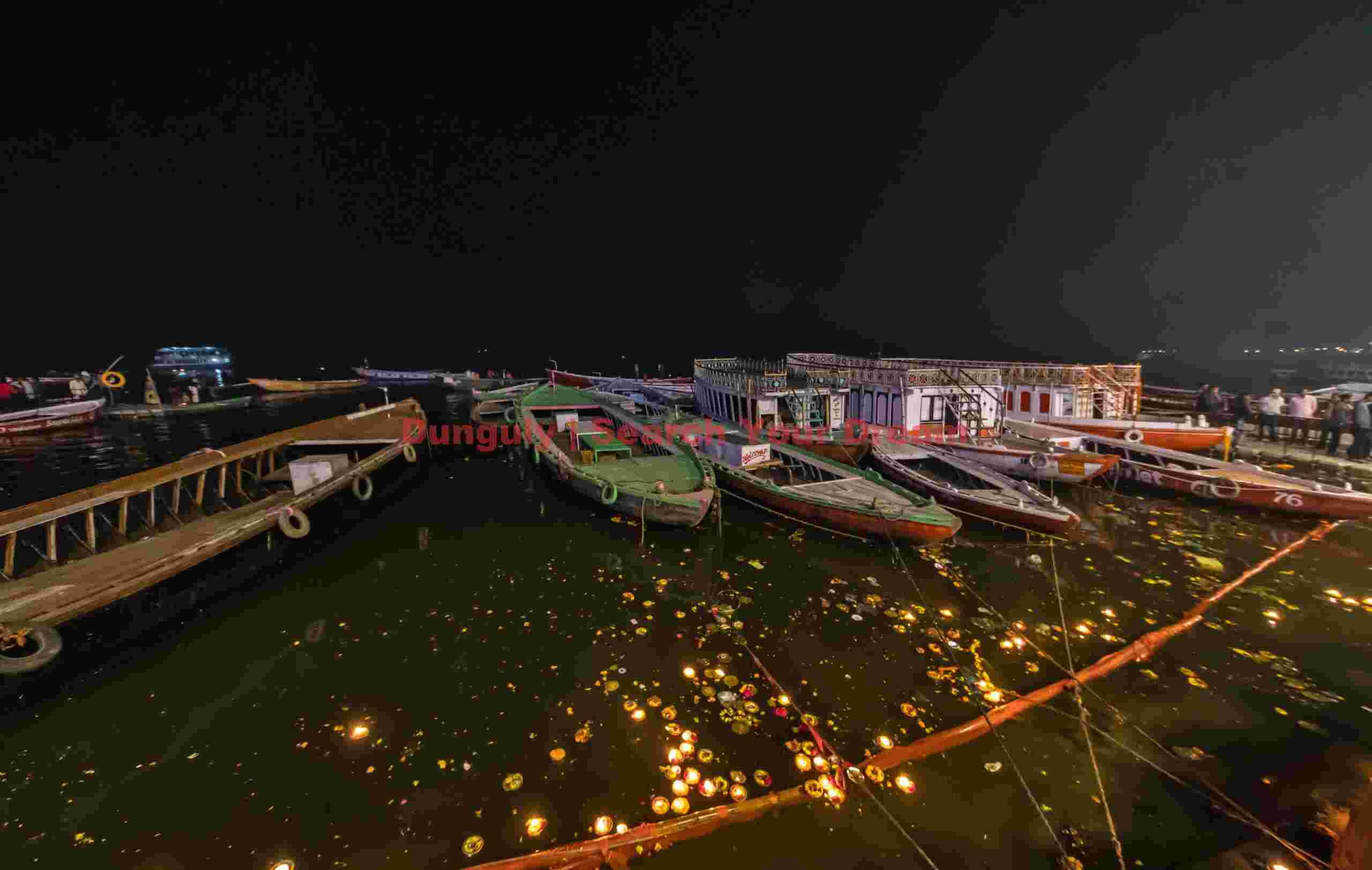 Nightscape - butter lamps and boats; Varanasi Nightscape - butter lamps and boats