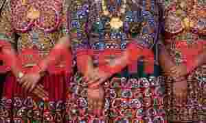 Three pairs of clasped hands
