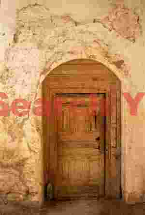 Battered orange door