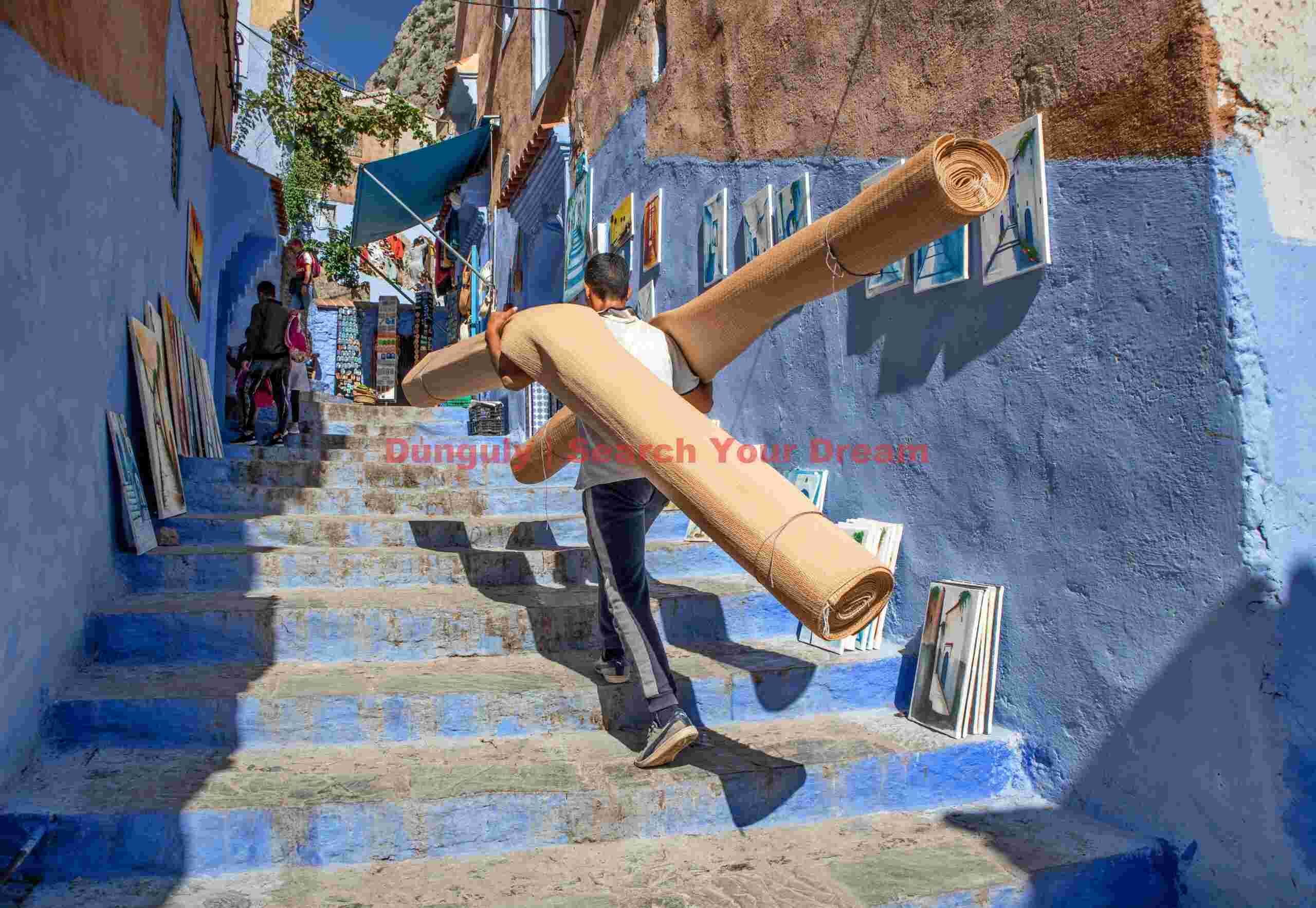 Carpet carrier; Chefchaouen, Morocco Carpet carrier