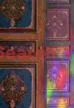 Light patterns on wooden doors