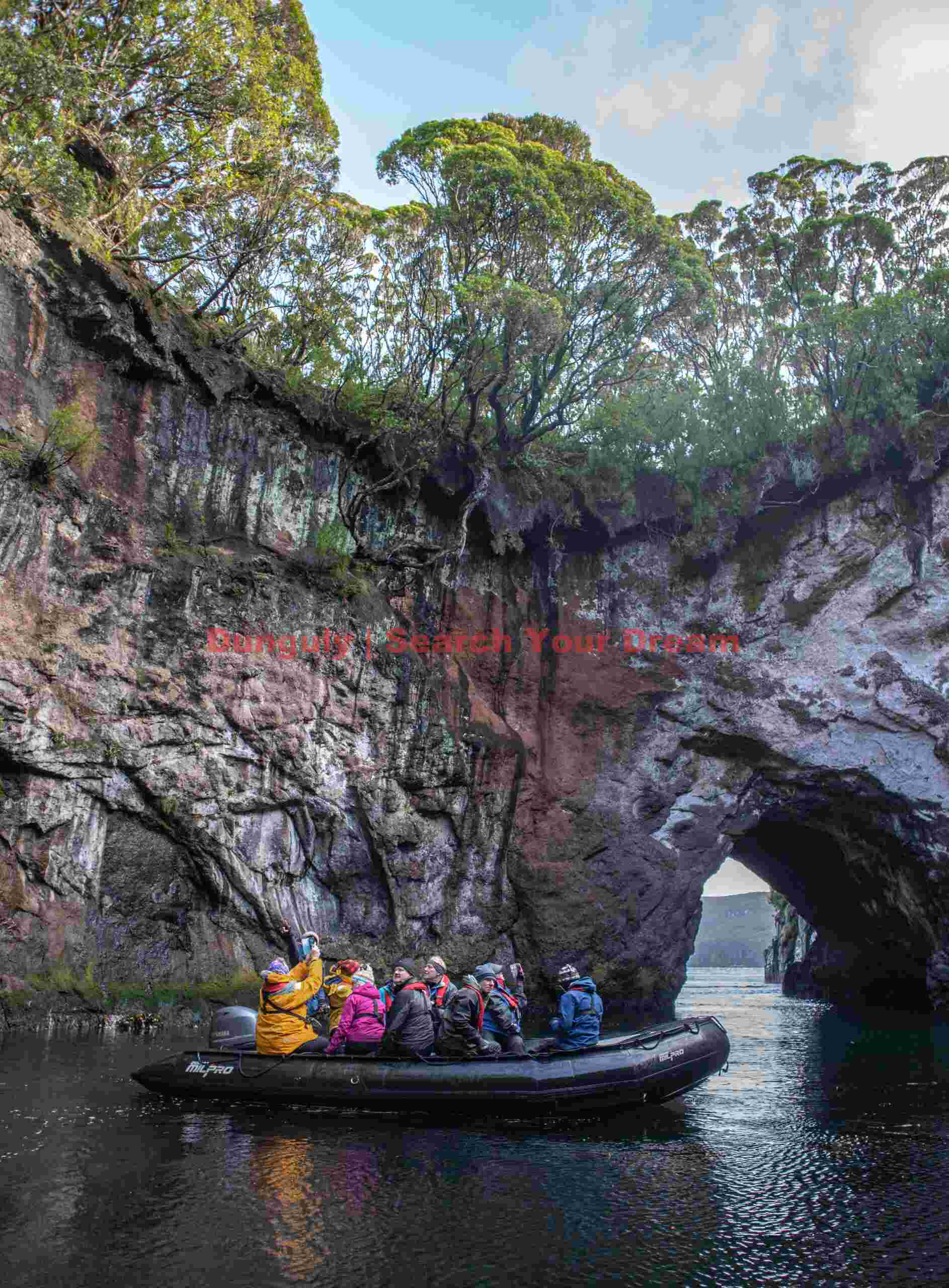 Zodiac cruise in the sea caves; Auckland Island Zodiac cruise in the sea caves