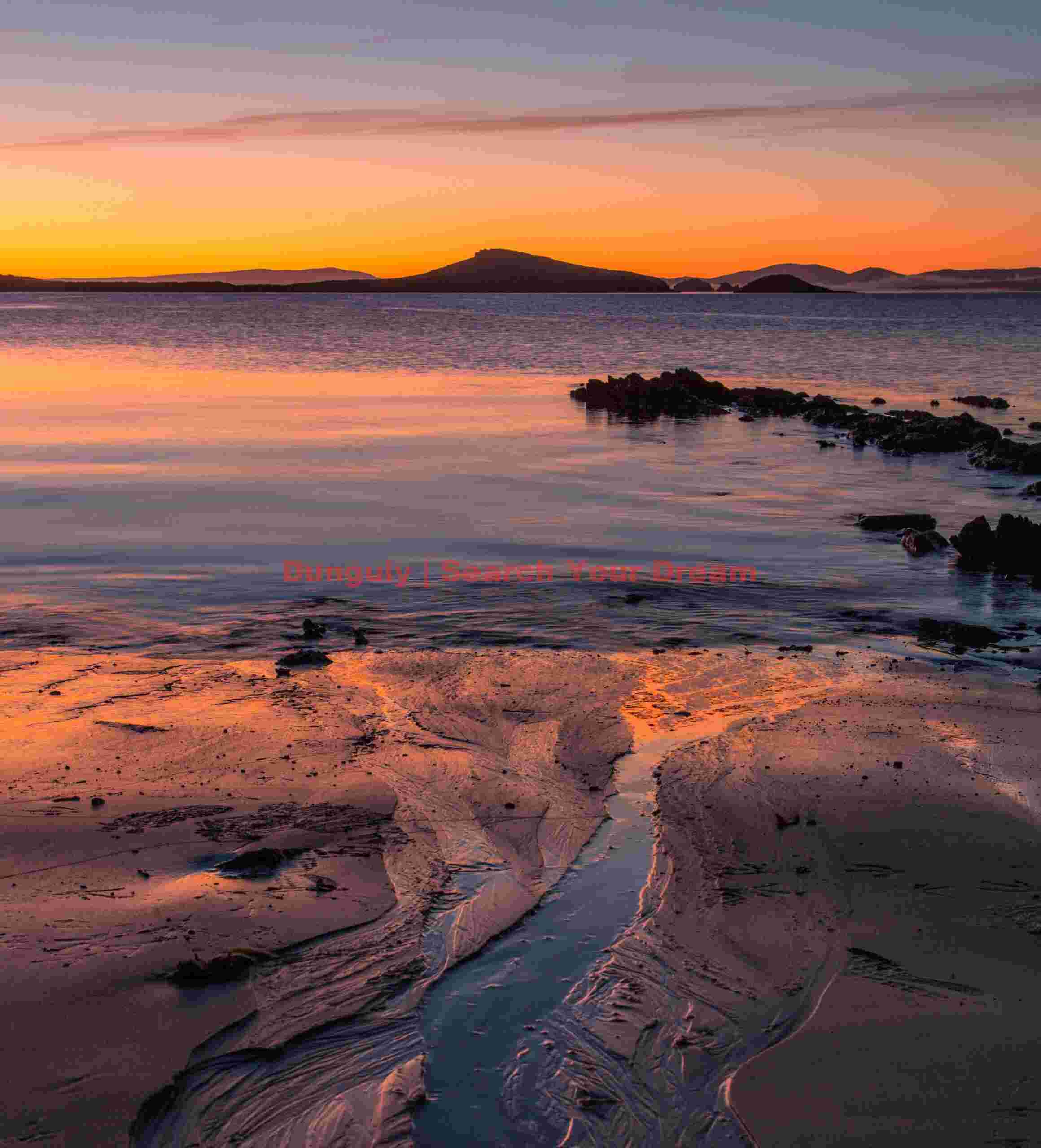 Glorious first dawn light from the beach in front of the farmhouse; Carcass Island, Falkland Islands Glorious first dawn light from the beach in front of the farmhouse