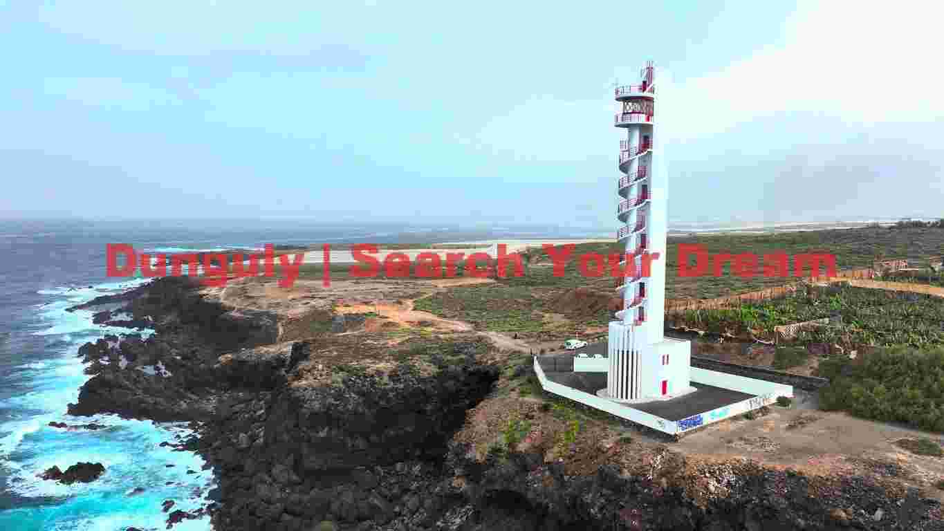 Crimson Spiral: The Volcanic Coast's Modern Sentinel Crimson Spiral: The Volcanic Coast's Modern Sentinel
