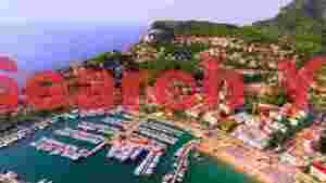 Coastal Paradise: Where Turquoise Waters Kiss Terracotta Shores