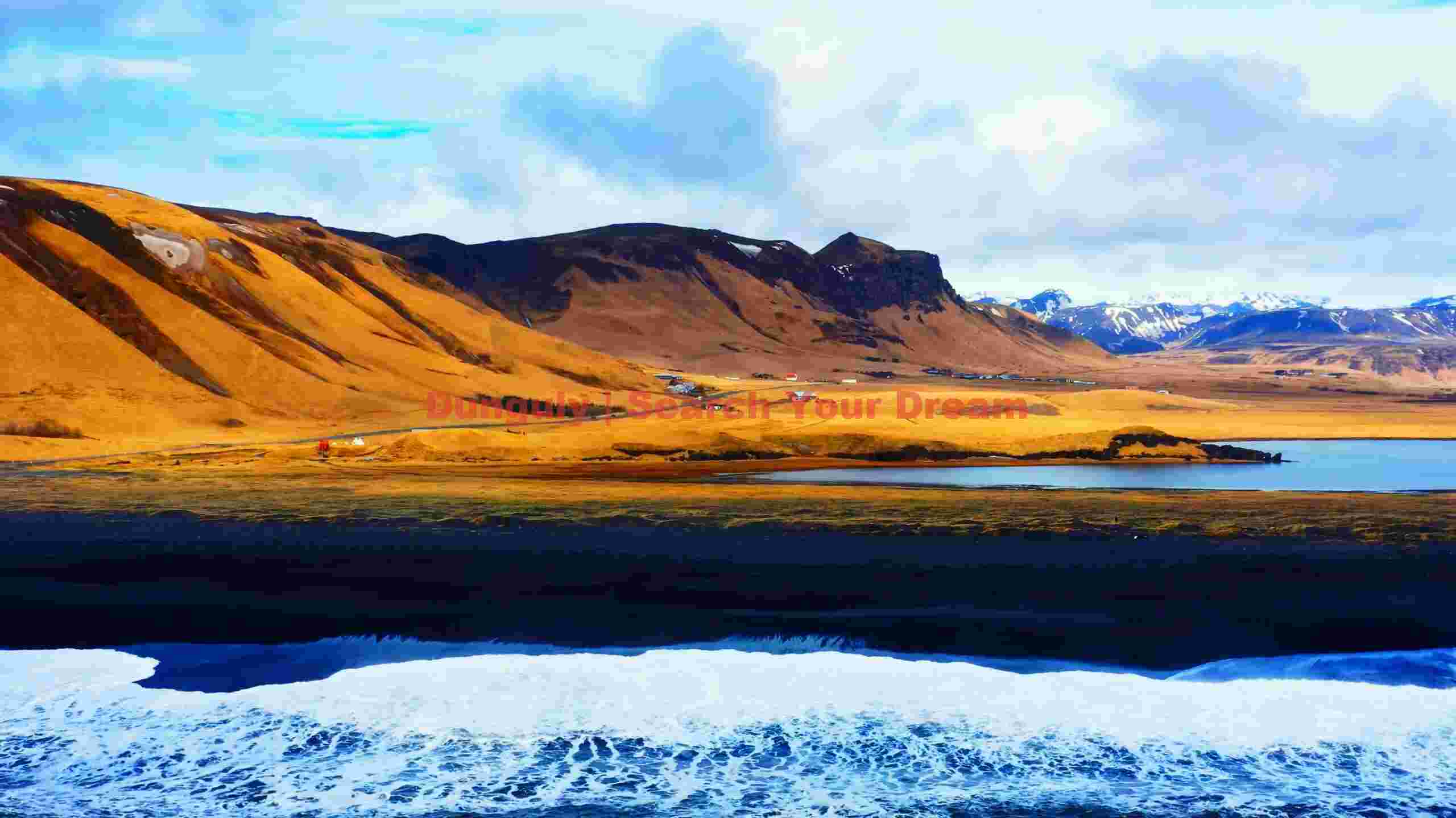 icelandic coastal panorama: golden hills & black sand beach icelandic coastal panorama: golden hills & black sand beach
