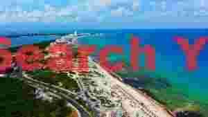 aerial panorama of a vibrant tropical coastal resort
