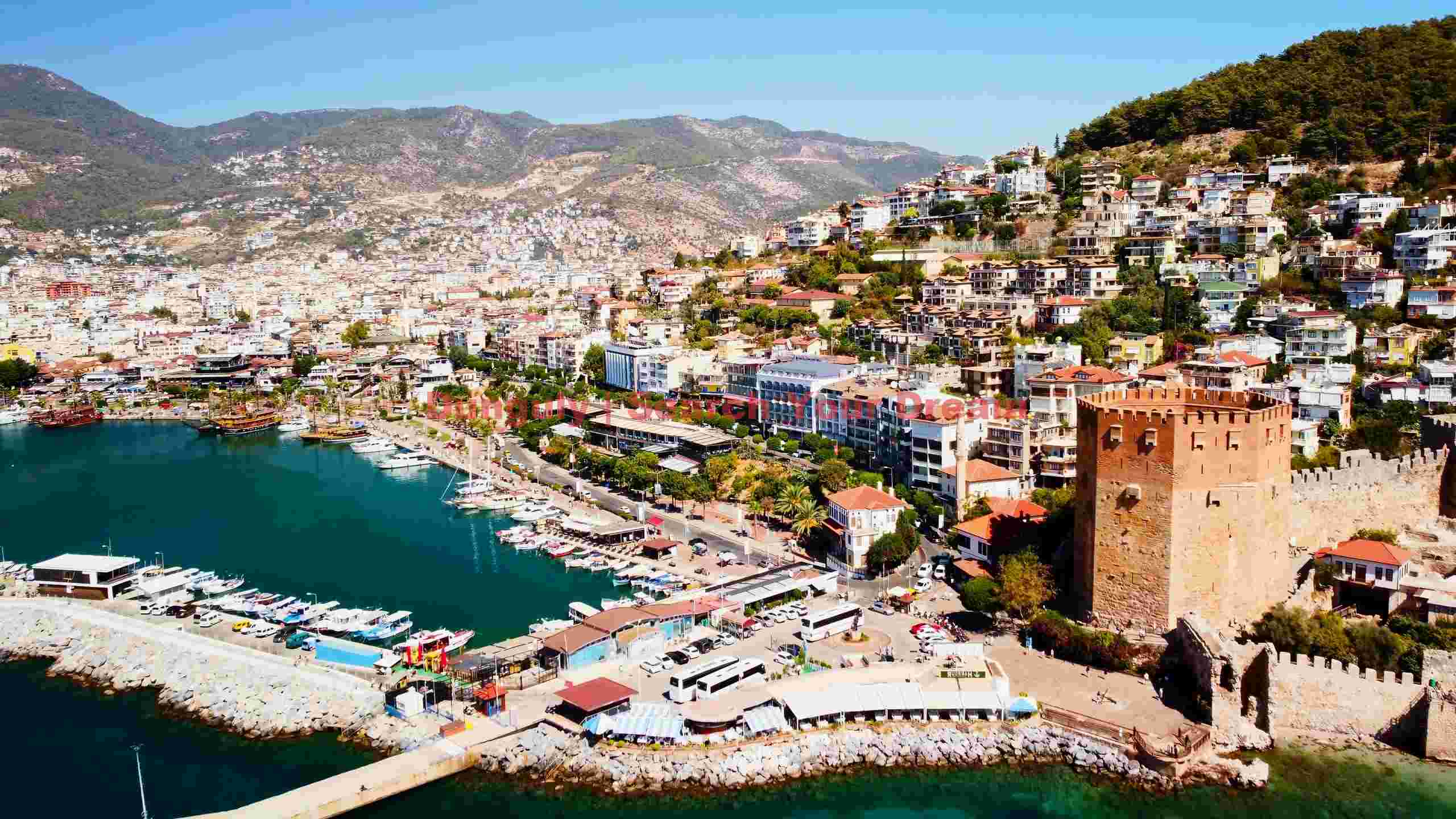 aerial view of alanyas historic harbor and cityscape aerial view of alanyas historic harbor and cityscape