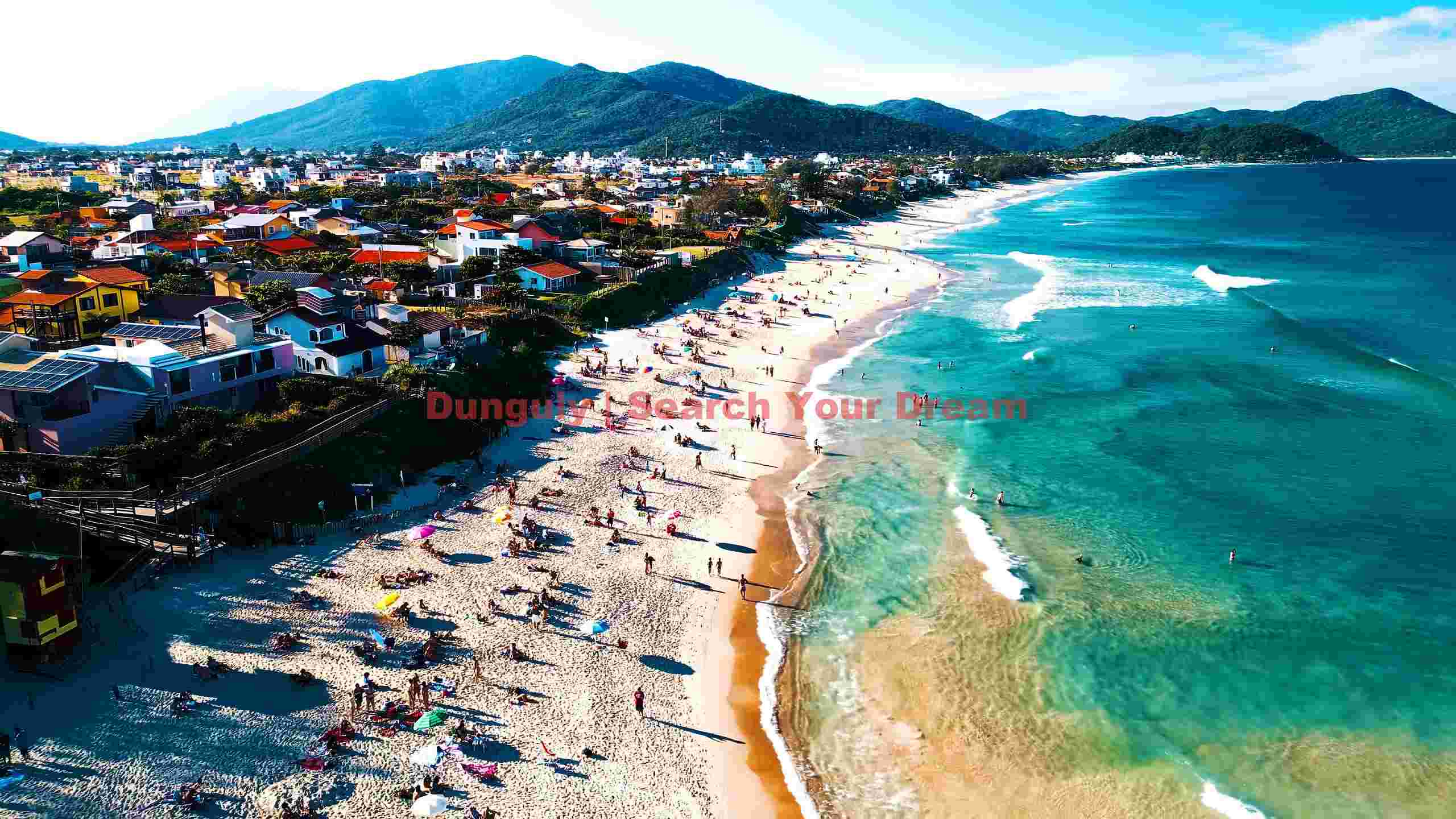 vibrant coastal beach town aerial view vibrant coastal beach town aerial view