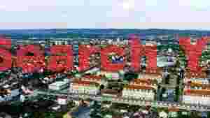 At Home aerial panorama of a european town
