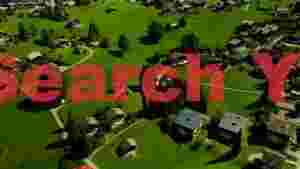 aerial view of green alpine village