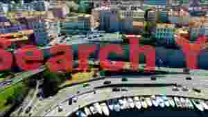 At Home aerial view of historic coastal city marina