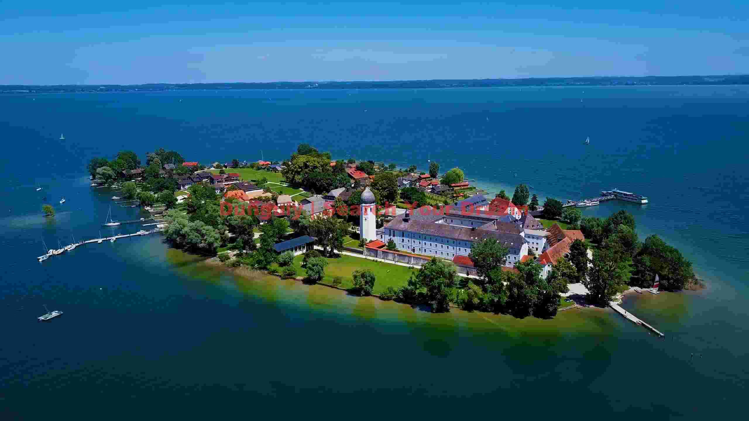 aerial view of historic island monastery on lake aerial view of historic island monastery on lake
