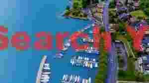 At Home aerial view of serene lakeside marina