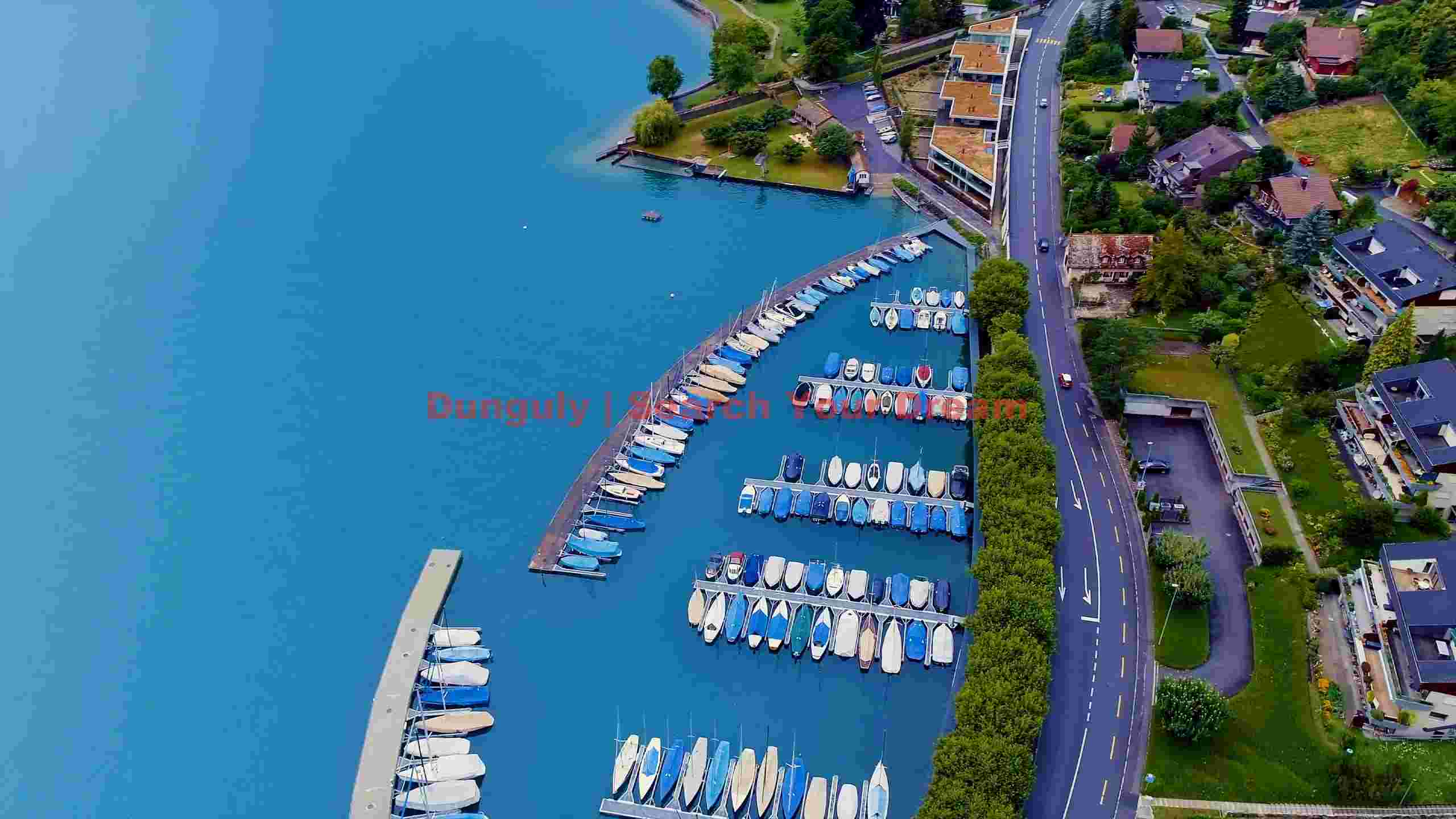 aerial view of serene lakeside marina aerial view of serene lakeside marina