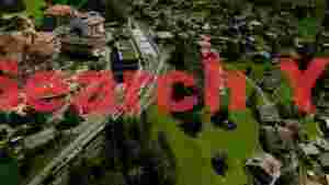 alpine village train journey aerial view