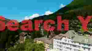 alpine village in lush swiss valley