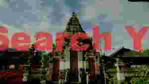 ancient balinese temple gateway in misty mountains