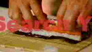 At Home art of sushi making hands crafting maki