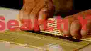 artisan sushi rolling process