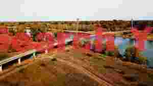 autumn serenity modern bridge over river