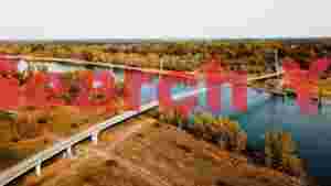 autumn tranquility modern pedestrian bridge over river