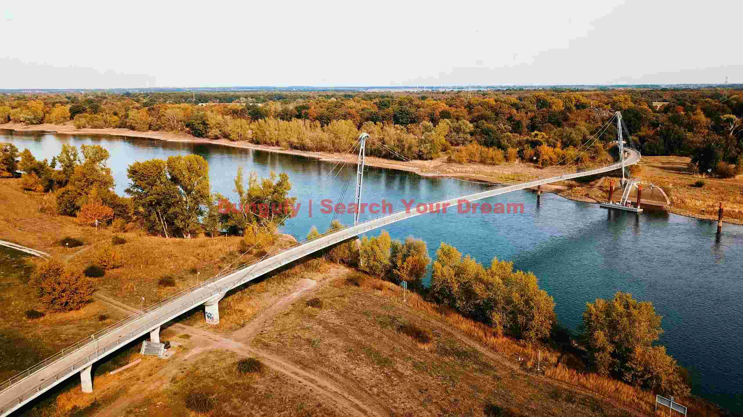 autumn tranquility modern pedestrian bridge over river autumn tranquility modern pedestrian bridge over river
