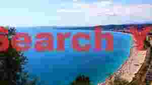 azure mediterranean coastline with bustling beach