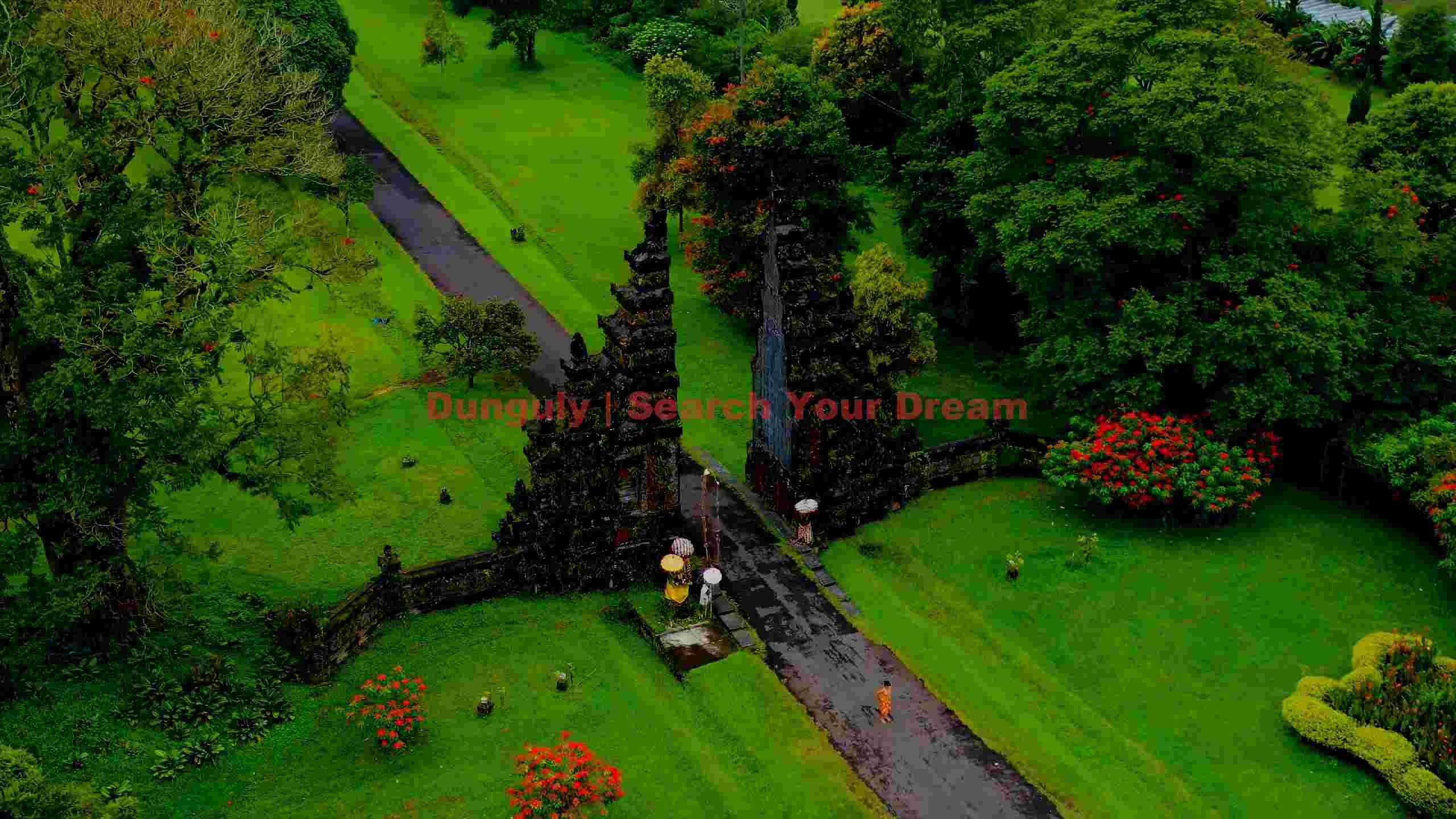 balinese temple gate entrance in lush gardens balinese temple gate entrance in lush gardens