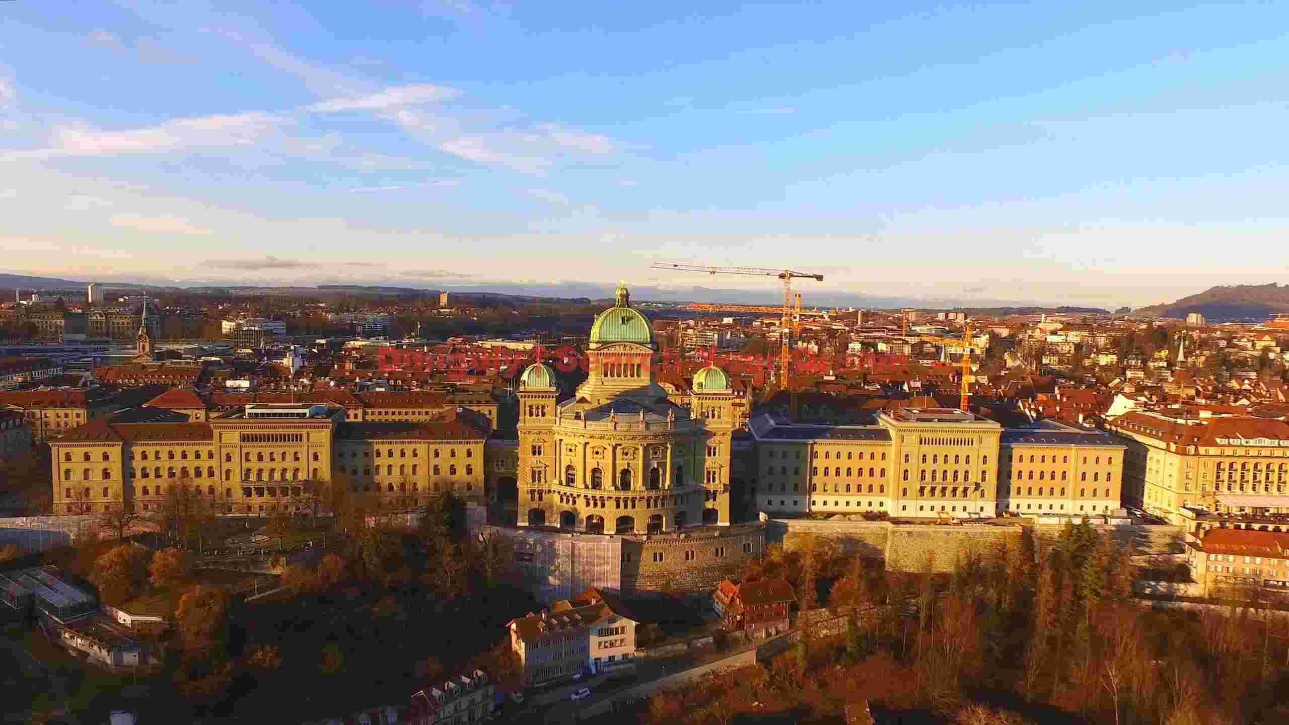 bern federal palace and cityscape at golden hour bern federal palace and cityscape at golden hour