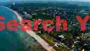 bustling coastal resort aerial beach view