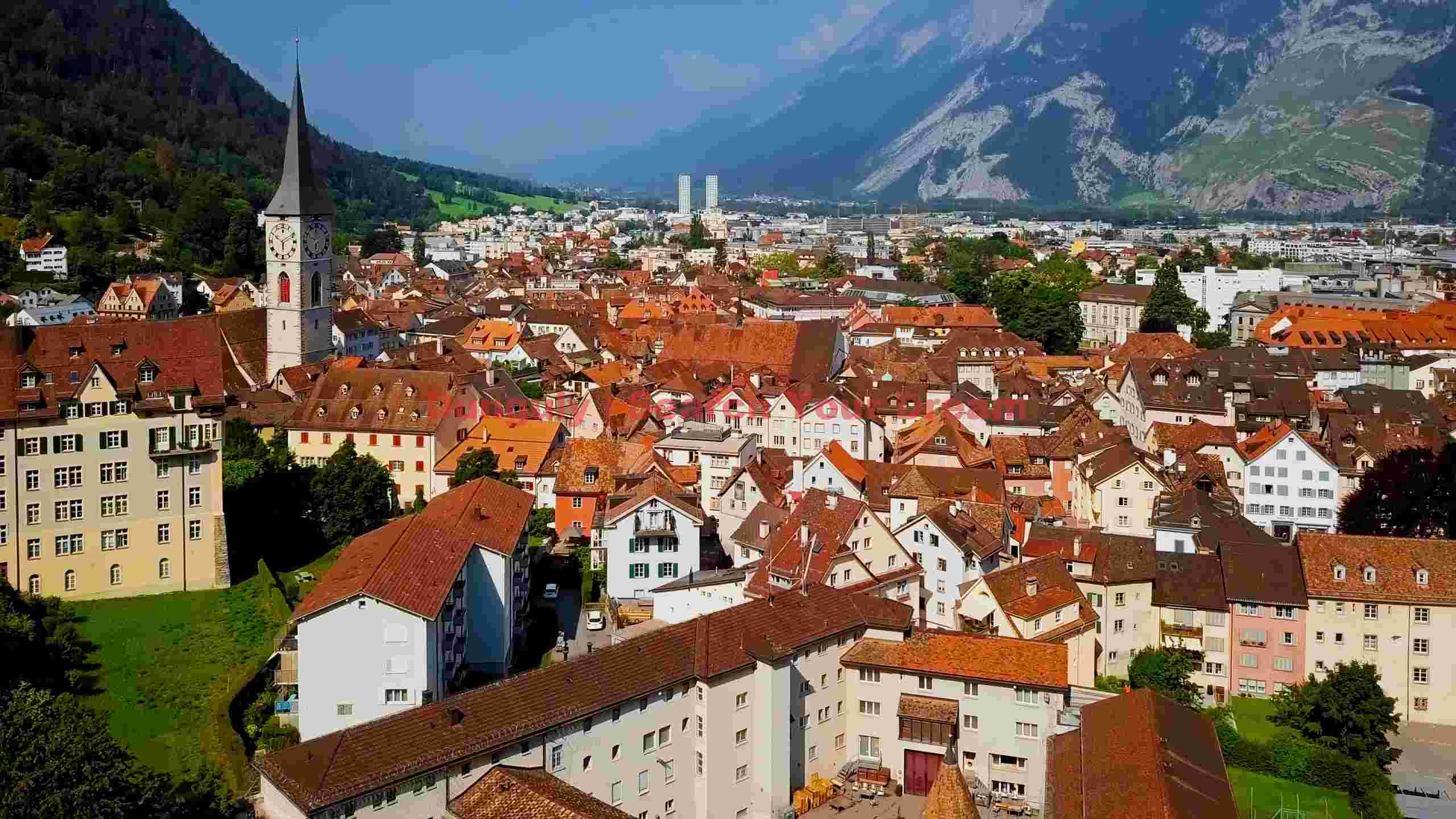 charming alpine townscape with historic church charming alpine townscape with historic church