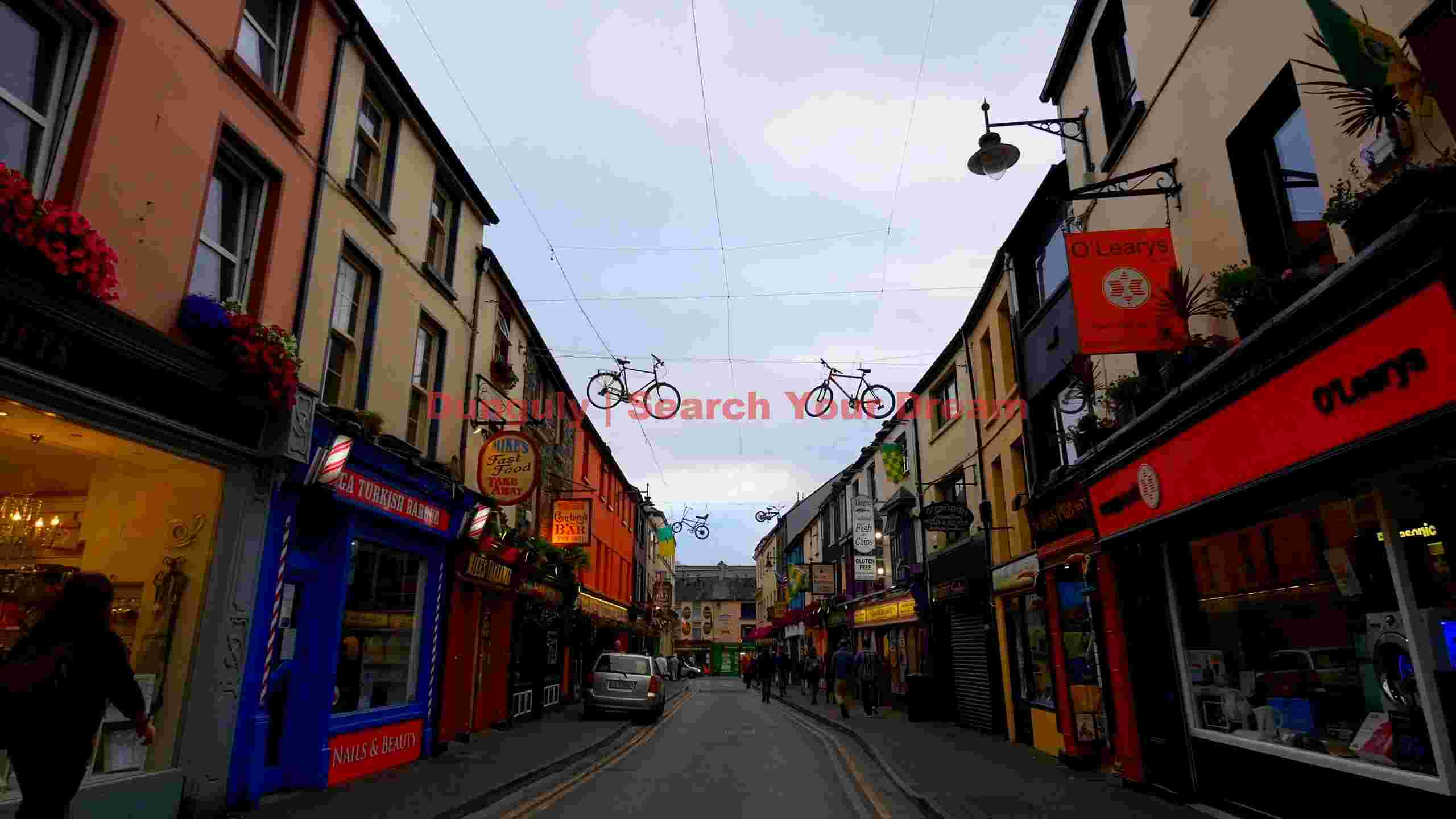 charming european street with artistic bicycle decor charming european street with artistic bicycle decor