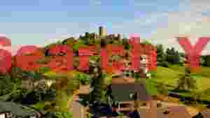 charming hillside village with ancient castle